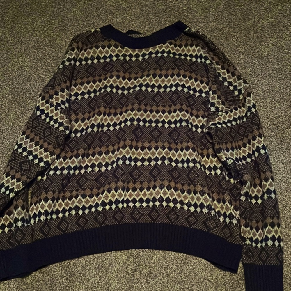 brown and tan patterned sweater